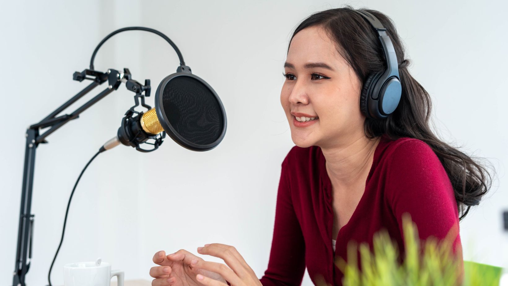 woman recording a podcast
